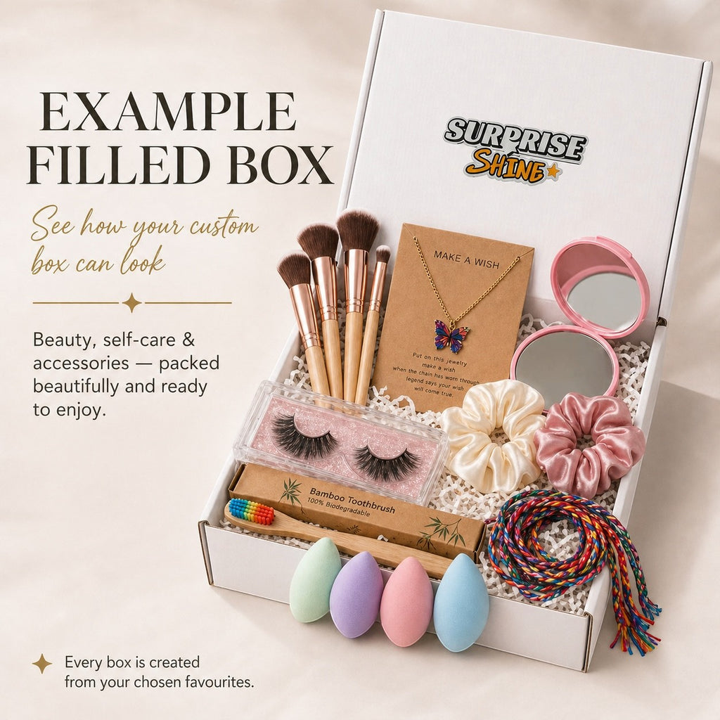 Surprise & Shine custom gift box filled with makeup brushes, false lashes, butterfly necklace, scrunchies, makeup sponges, and a bamboo toothbrush.