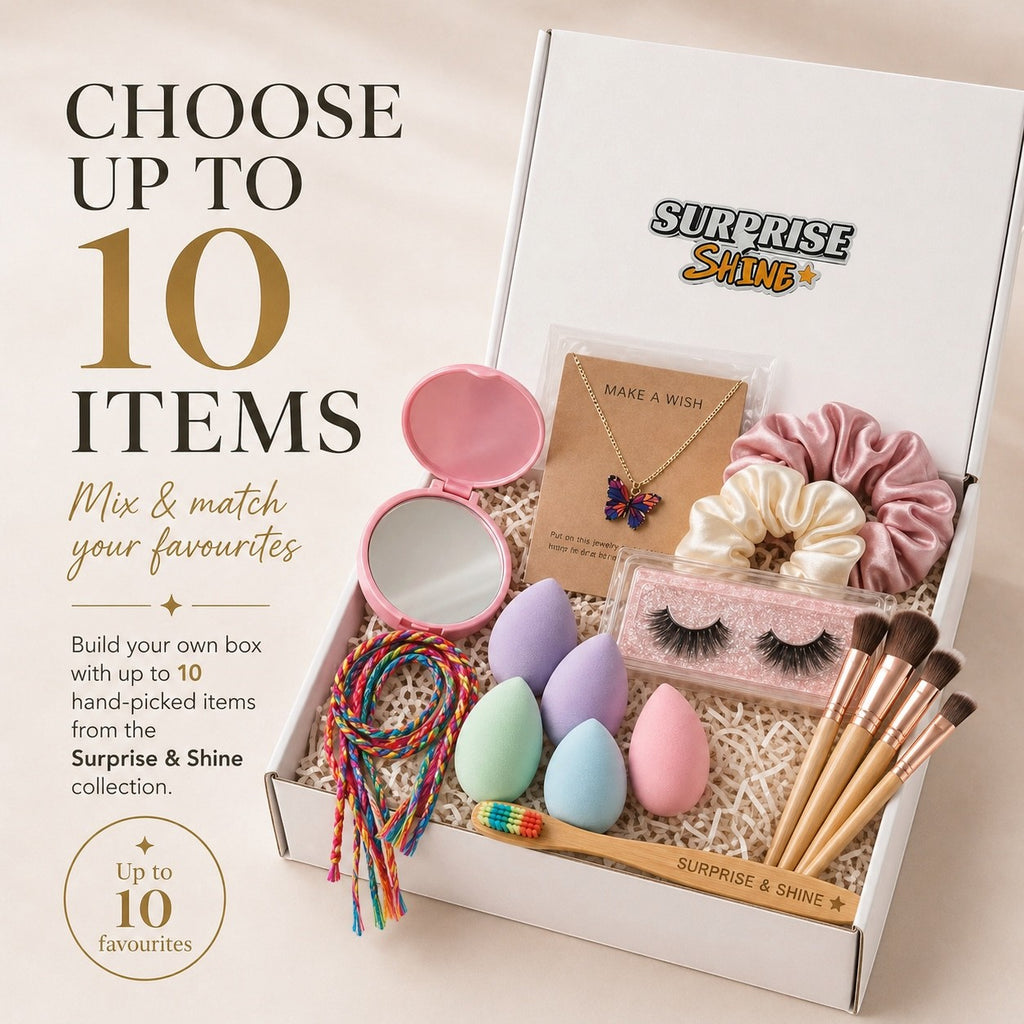 Surprise & Shine customizable gift box with makeup sponges, scrunchies, false lashes, makeup brushes, necklace, and mirror.