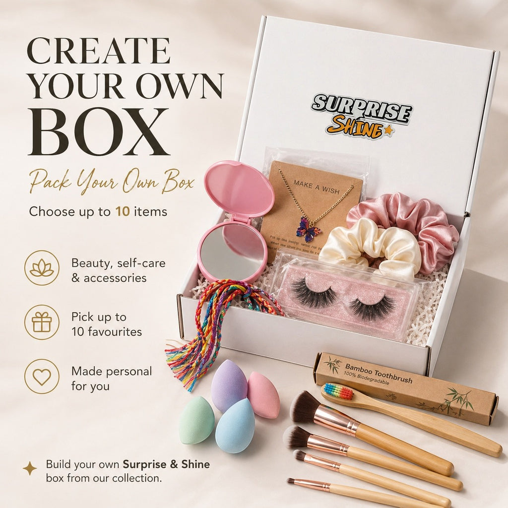 Surprise & Shine customizable gift box with makeup brushes, false lashes, scrunchies, butterfly necklace, makeup sponges, and a compact mirror.
